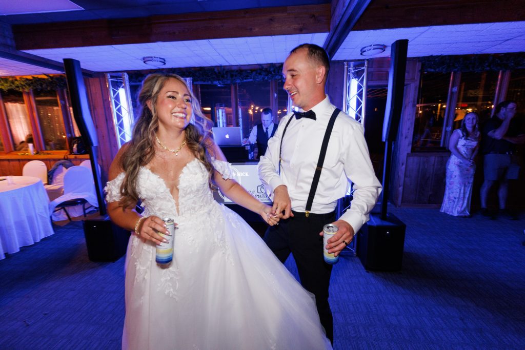 Bianca and Nick, the Lakewoods Resort wedding couple, share a joyful moment on the dance