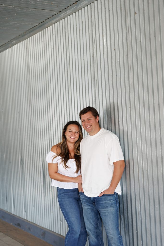 Cassie and Daniel, the engaged couple, smiling together during their engagement photography session near Duluth