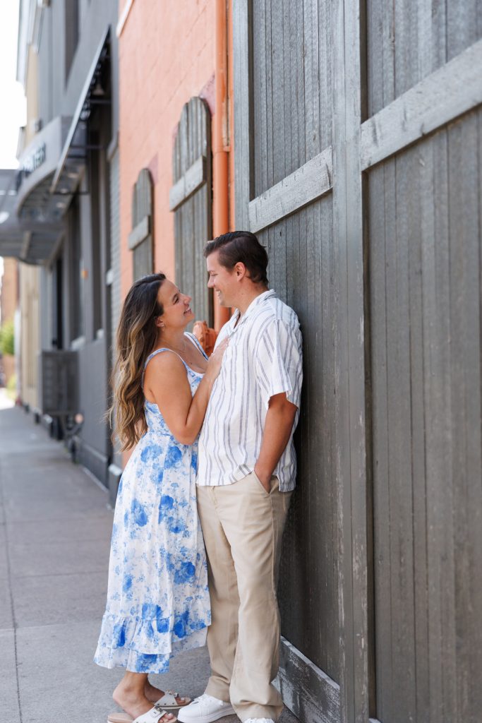 Cassie and Daniel, the engaged couple, share a tender moment during their Lake Superior engagement