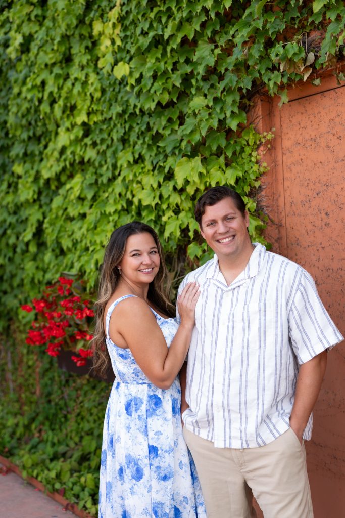 Cassie and Daniel, the engaged couple, smiling warmly during their Duluth and Bayfield engagement session