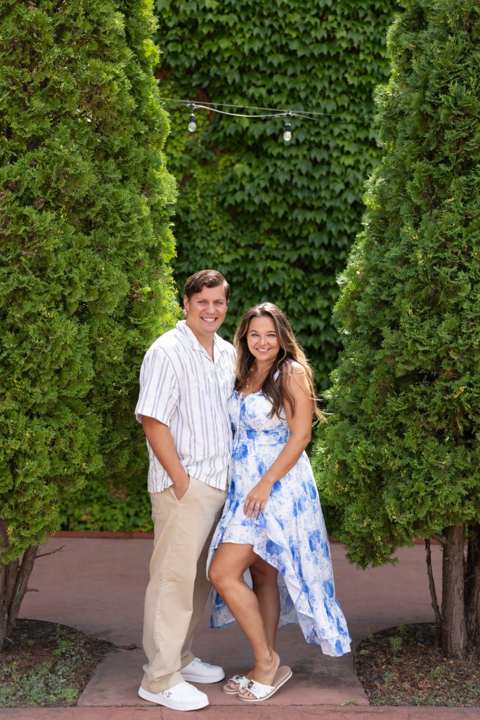 Cassie and Daniel, the engaged couple, smile warmly during their Duluth and Bayfield engagement session