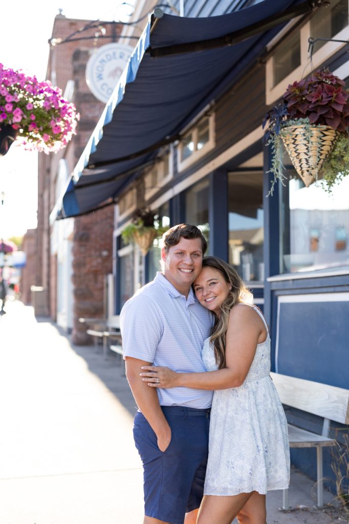 Cassie and Daniel, the engaged couple, share a loving moment during their Bayfield and Duluth